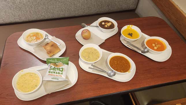 All seven Panera soups on table