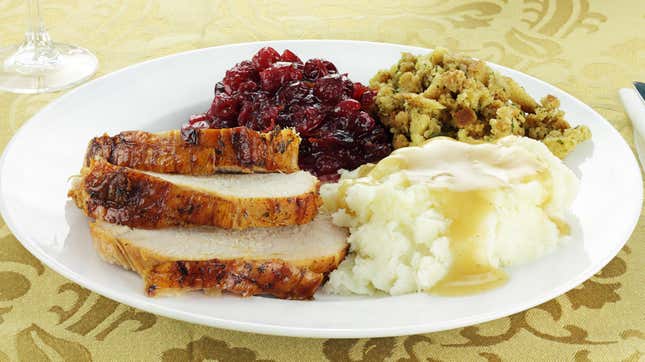 Roasted turkey with mashed potatoes, cranberry sauce, and stuffing