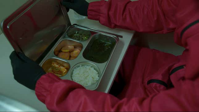 dinner tray with kimchi, rice, and sauce, Squid Game