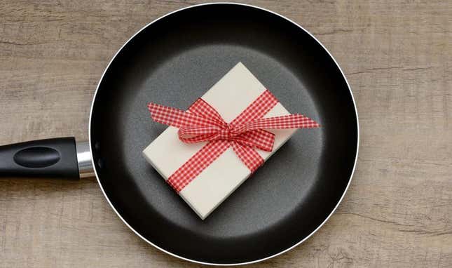 Frying pan with gift inside