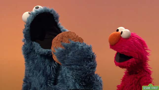 Cookie Monster and Elmo eating cookies on Sesame Street