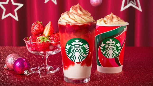 two starbucks strawberry drinks on table