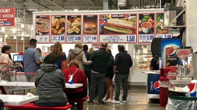 Costco food court menu board with $1.50 hot dog combo
